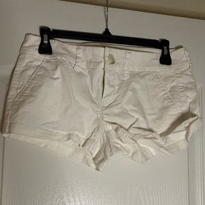 All white low waisted shorties